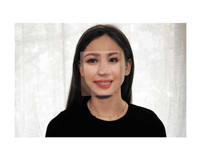A series of photographs of Audrey at 19 overlayed with images from a website created by Philip Wang which uses core software developed by Ian Goodfellow, the inventor of generative adversarial networks. Wang's website creates faces that are generated from a dataset of celebrities by artificial intelligence or machine learning. The resulting output of images are fictions of people who do not exist.