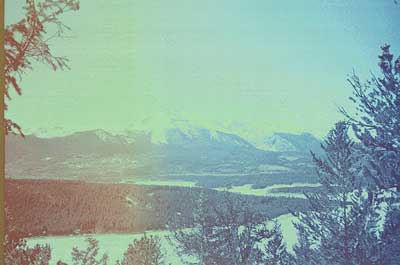 A photograph from a roll of film found in an camera from an estate. The image is an unknown ski resort from the late 1970s to early 1980s. The photograph is reminiscent of a Japanese Wood Block print. 